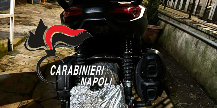Napoli, a Pianura, in sella ad una moto con la carta stagnola sulla targa